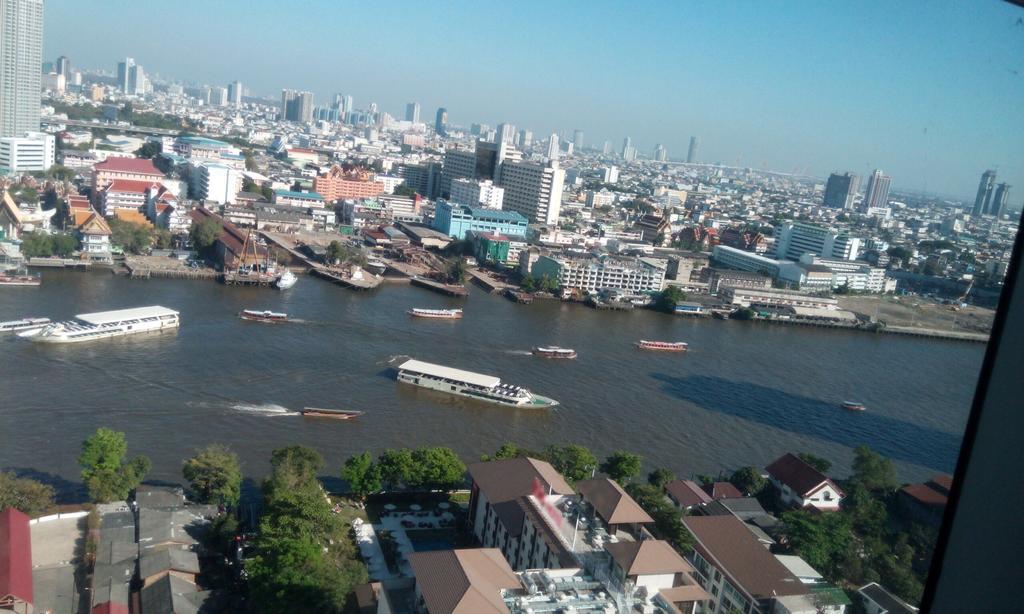 Baan Sathorn Riverfront Банкок Стая снимка